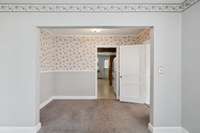 This space can be used as a small library, office, or seating area