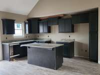 Beautiful and Durable Granite Counter Tops. 
Picture of Previous House.