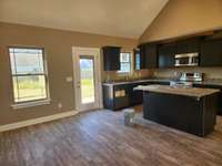 Stainless Smooth Top Stove, Dishwasher and Built-In Microwave are provided.
Picture of a Previous House.