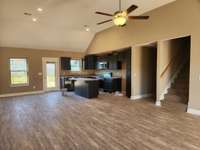 Welcome Home to this Wonderful New House Plan!  Spacious Living Room, Kitchen and Dining Room! Picture of Previous House.