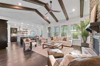 Beautiful open floorplan. Vaulted ceiling with wood beams.