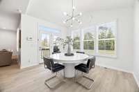 Vaulted ceilings in the breakfast room maximize the light, creating an airy, inviting space that connects directly to the kitchen.