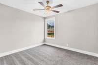 Each bedroom is thoughtfully outfitted with its own ceiling fan, providing personalized comfort and a gentle breeze for restful nights year-round.