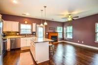 Spacious kitchen in which you could eat at the bar OR in the designated dining area