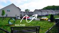 The dog park, and the arrow points to the condo