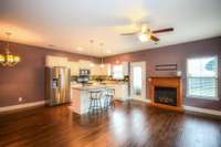 Open concept (The fireplace is a furniture piece, not a fixture, but it is negotiable.)