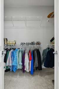 Primary walk-in closet.