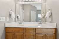 Primary bedroom double vanity area.