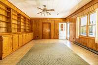 Den with utility room through the door on the end.