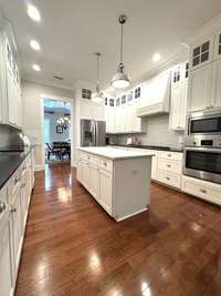 Clean, cohesive space with extensive counter space for the Chef of the house!