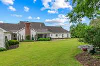 A firepit is to the right for entertaining, s'mores, or gathering on a chilly evening.