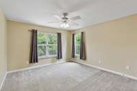 The second upstairs bedroom has natural light from the north and east