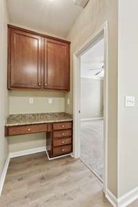 Recessed desk area off the kitchen and bedroom