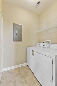 Mudroom and laundry concealed at the garage entry