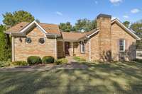 205 Bluegrass Dr, Columbia, TN in Chestnut Villa subdivision, with no HOA fees.  This lovely mostly brick home boasts 2 new HVACs, a new water heater.  Owners added large pole barn behind home.