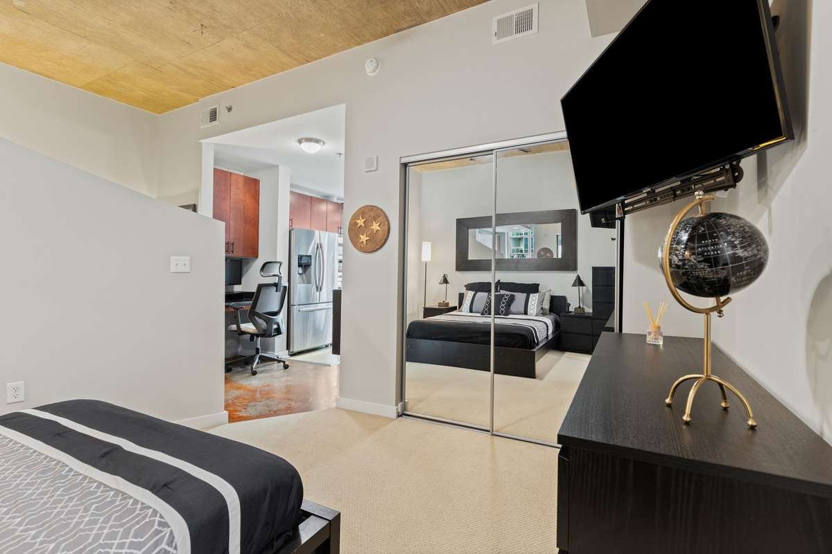 Bedroom includes a 2nd TV mounted. Large closet.