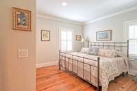 Guest bedroom with plenty of space for a king size bed as pictured.
