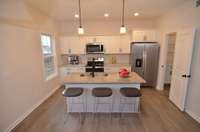 Virtually staged for effect! LARGE KITCHEN ISLAND!