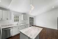 Widnow overlooking the back yard at the sink in the Kitchen