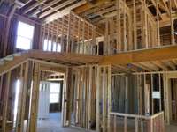 Here is your overlook from the upper level into the living room. Bedrooms 2 & 3 are located upstairs with a full bath. Also, the bonus room is located at the end of the hall with a closet for storage.