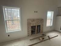 Work still in progress. Beautiful gas fireplace.