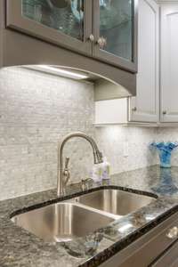 Stylish backsplash and granite counter tops