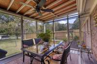 Screened in deck off the kitchen