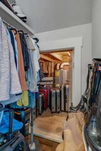See the extra closet here that also stores the tankless water heater.