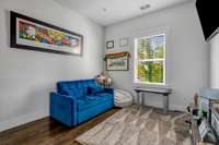 Secondary bedroom currently used as a game room