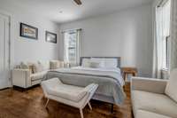 Large guest room with a full bathroom across the hall. Also, a secured closet within the closet that is used as a storm shelter.