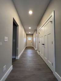 Front door with long entry hall