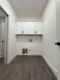 Laundry off of mud room and master closet
