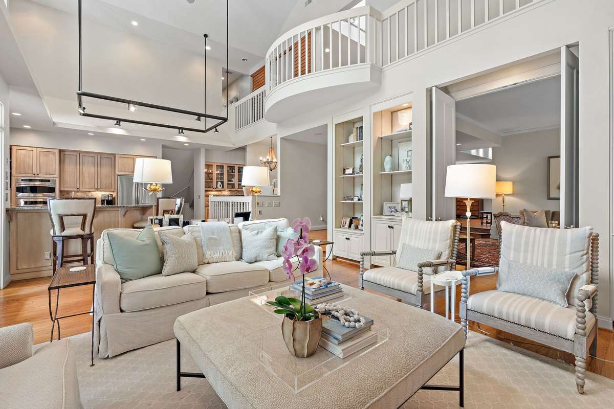 large balcony overlooking the kitchen and main living space