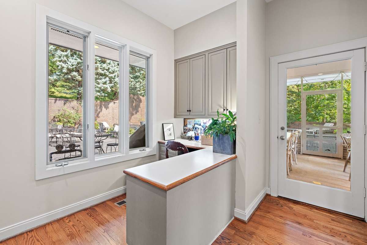 built-in desk off of the kitchen
