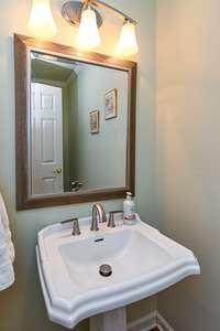 Powder Room/Half Bath behind Entry Foyer