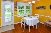 Breafast area overlooks & opens to patio & Salt Water Pool!