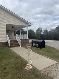 This mailbox is down the driveway next to the back porch and USPS still delivers all the way down the driveway! :)