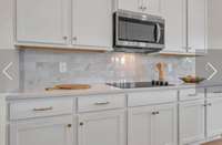 This photo is of a previously built RIDGELAND II  Home and is a good representaion of the home being built in Rutherford of Columbia on lot 39. Finishes and colors may vari on the actual home in Rutherford lot 39