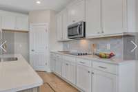 This photo is of a previously built RIDGELAND II  Home and is a good representaion of the home being built in Rutherford of Columbia on lot 39. Finishes and colors may vari on the actual home in Rutherford lot 39