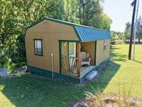 Separate finished structure for guesthouse, studio or office! Connected to septic, water, electric & has mini split HVAC!