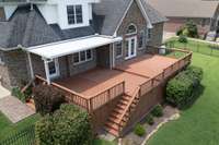 This spacious deck allows for so many options!  Partially shaded for dining, sunny for sunbathing and perfect for entertaining!