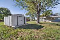 Storage shed for lawn care tools and toys!