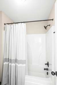 The upstairs bath is conveniently located near bedrooms 3 and 4.