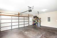 Two car garage for all your parking and storage needs! The garage is conveniently located on the side of the house, offering interior access across the hallway from the kitchen.