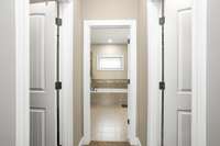 Enjoy double walk-in closets, double vanities, and a garden tub in the primary suite.