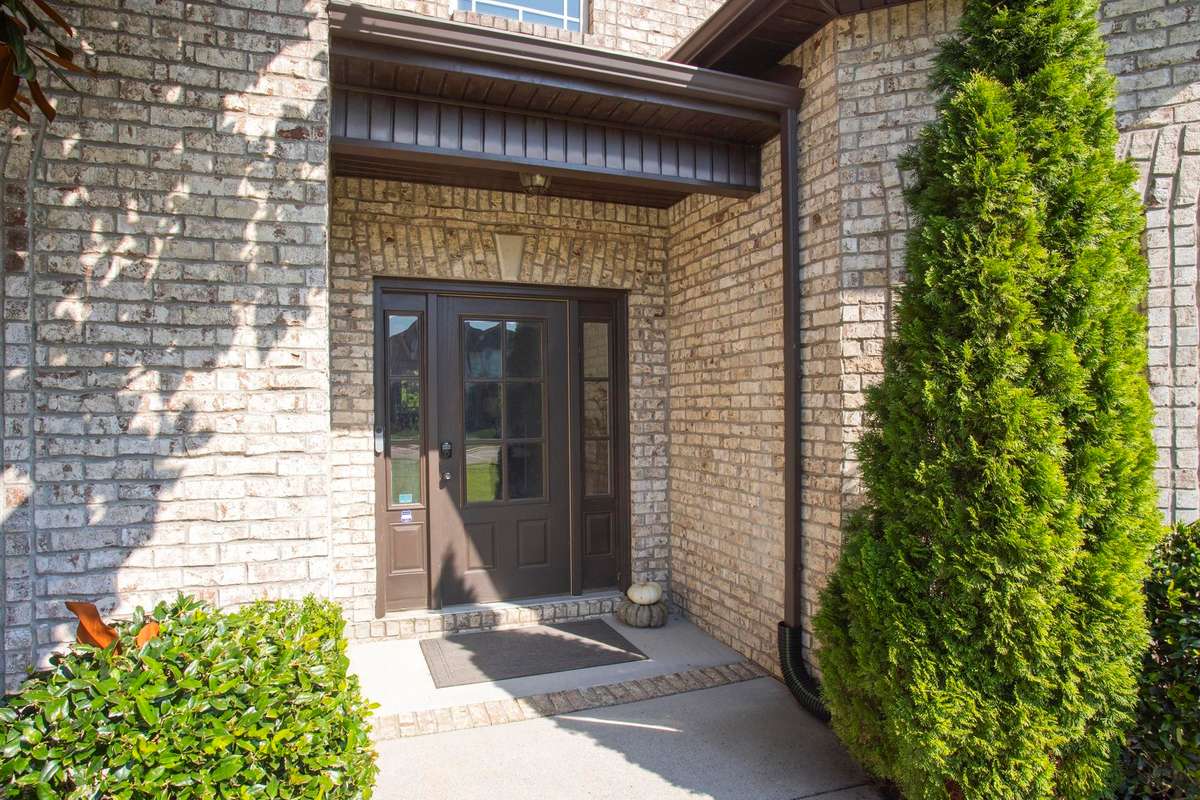 This all brick house offers a classy and inviting entrance!