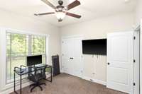 Bedroom 2 located downstairs is currently being used as an office/flex space.