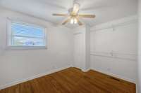 Third Bedroom has hardwood Floors and single window.  Ceiling Fan and Separate Closet.