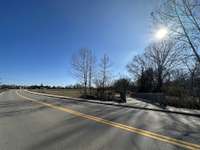 Across the street from a beautiful greenway and dog park