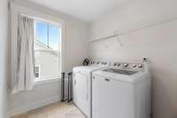 Laundry room on the second floor with all the bedrooms